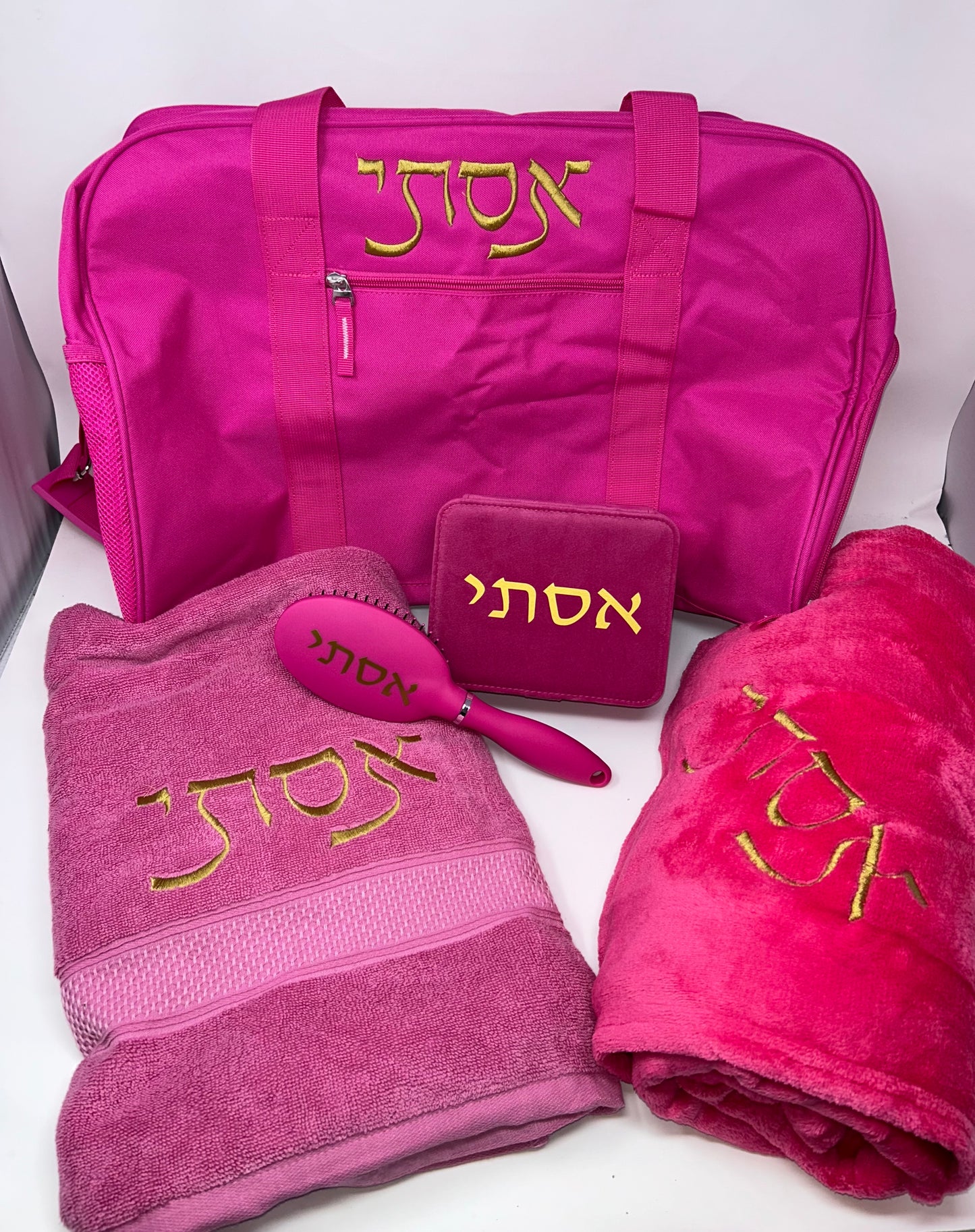 Duffle bag + blanket + towel + jewellery box + brush